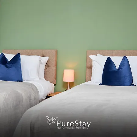 Stylish 5-bedroom Retreat Sleeps 9 By Purestay Manchester