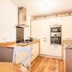 Family-friendly 4-bedroom House In Moston With Parking And Garden
