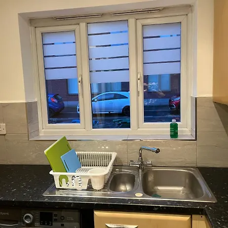 Holiday home Entire Captivating 2-bed House In *