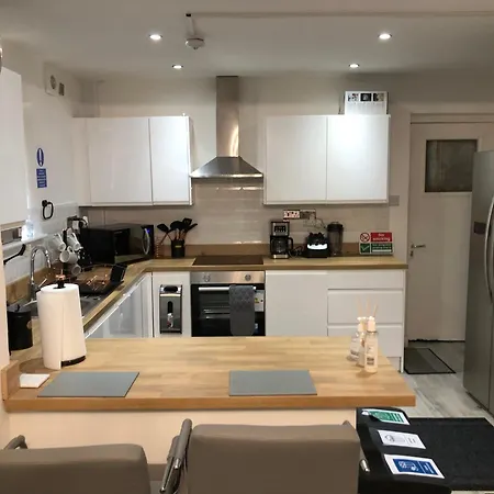 Quarto em Acomodações Particulares Garswood Road House *