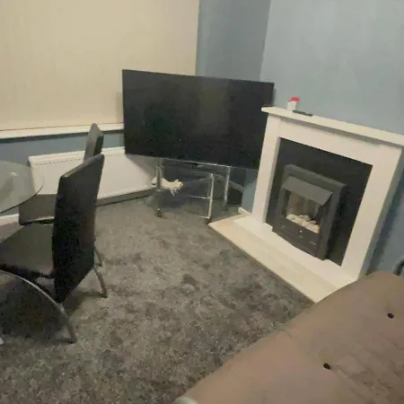 Housesleeps9-fireplace-garden-bbq-tv Holiday home Manchester