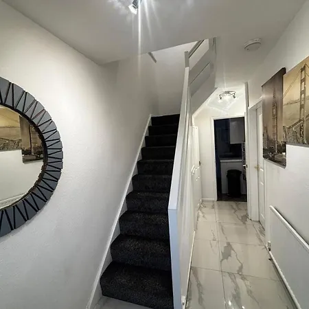 Housesleeps9-fireplace-garden-bbq-tv