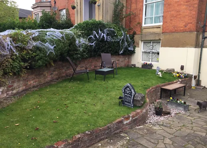 Queens Casa de hóspedes